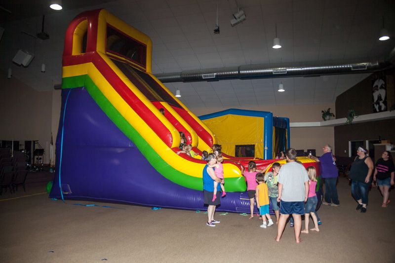 kids enjoying indoor inflatables