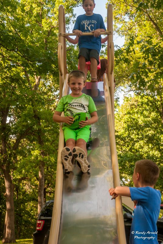 kids having fun on the slide